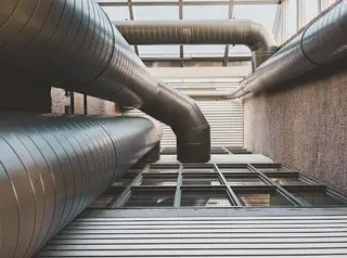 Shiny ductwork that looks like a stock image